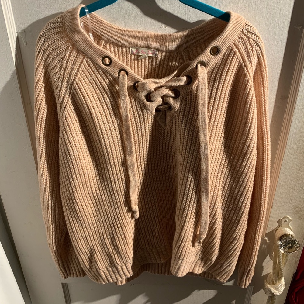 pale pink lace up sweater